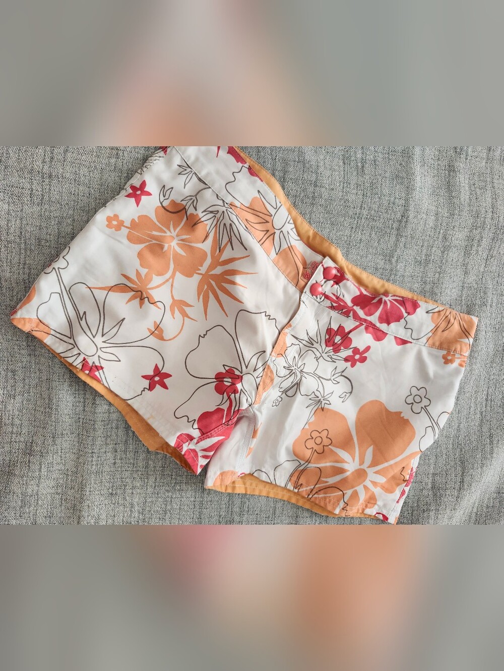 2/$20 Reversible Women’s White Floral Swim Shorts with Orange and Pink Accents